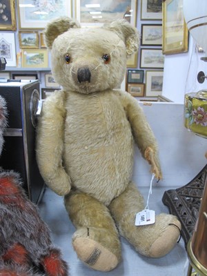 Lot 1491 - Merrythought Gold Plush Teddy Bear (worn),...
