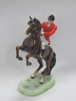 Lot 1240 - Beswick Huntsman on Rearing Horse, stamped 868,...