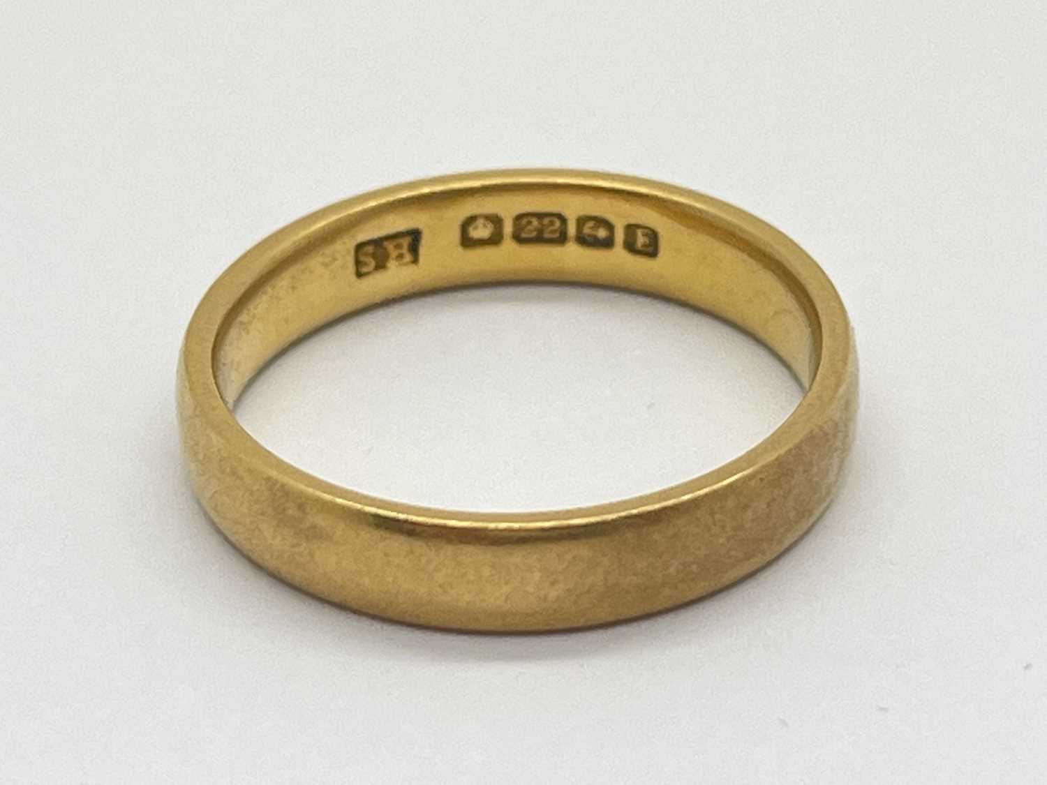 Lot 43 - A 22ct Gold Wedding Band, of plain design...
