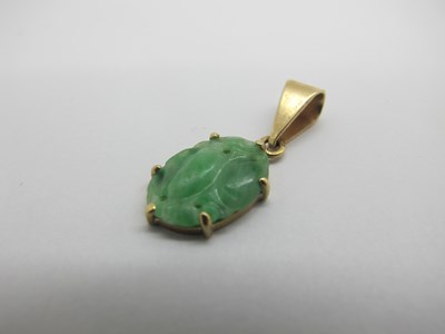 Lot 76 - A Pair of Carved Jade Drop Earrings, each with...