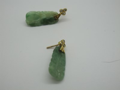 Lot 76 - A Pair of Carved Jade Drop Earrings, each with...