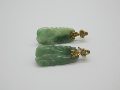 Lot 76 - A Pair of Carved Jade Drop Earrings, each with...