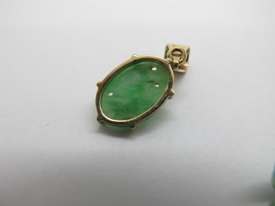 Lot 76 - A Pair of Carved Jade Drop Earrings, each with...
