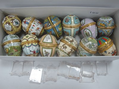 Lot 1289 - Halcyon Days Enamelled Easter Eggs, complete...