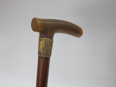 Lot 1330 - Horn Handled Walking Cane, with yellow metal...