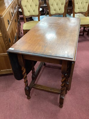 Lot 1508 - 1930s Oak Gate Leg Table, with drop leaves, on...