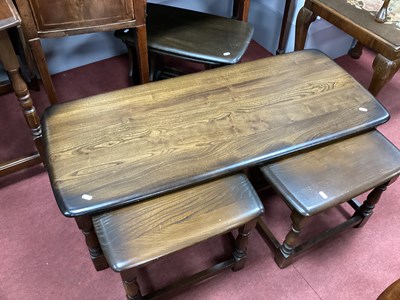 Lot 1557 - Ercol Style Nest of Tables, on turned and...