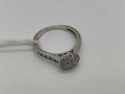 Lot 209 - A Modern 18ct White Gold Diamond Cluster Ring,...
