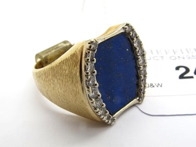 Lot 248 - A Lapis Lazuli Panel Ring, the shaped...