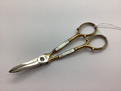Lot 17 - A Pair of Vintage Gilted Ed Wusthof Mother of...