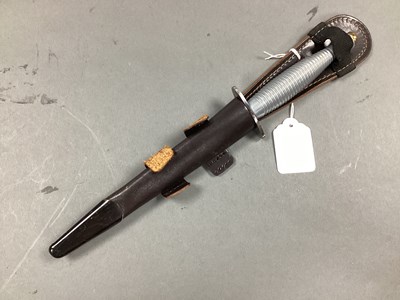 Lot 495 - Fairbairn Sykes Fighting Knife and Scabbard,...