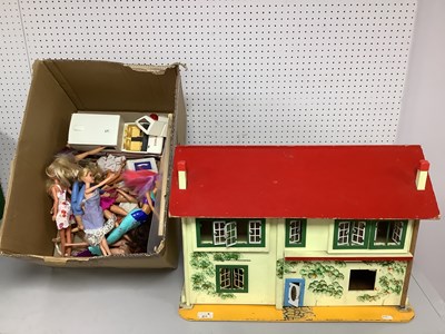 Lot 311 - A Dolls House (damaged) with sparse contents...