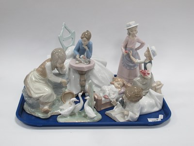 Lot 1171 - Lladro Figurines, Lady at Table with Cat and...