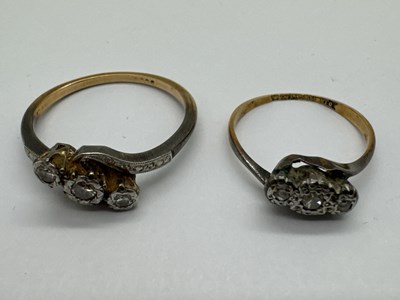 Lot 115 - A Three Stone Diamond Crossover Ring, the...