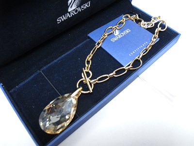 Lot 140 - Swarovski; A Chunky Gilt Coloured Fancy Link...