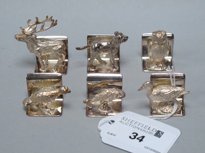 Lot 34 - Six Hallmarked Silver Novelty Place Card...