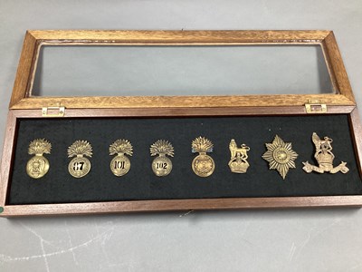 Lot 409 - XIX Century British Army Helmet/Cap Badges,...