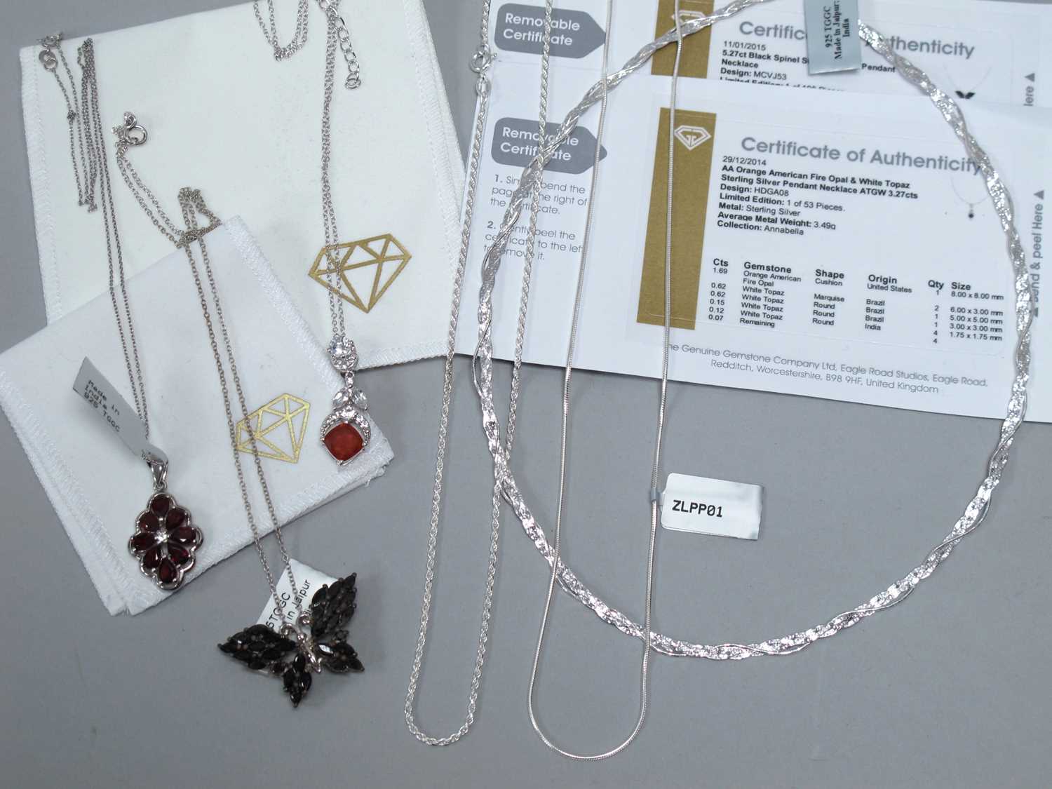 Lot 142 - The Genuine Gemstone Company; Three "925"...