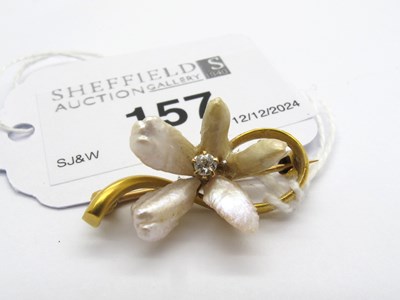 Lot 157 - A Baroque Pearl Bar Brooch, of flowerhead...
