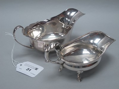 Lot 31 - An Edwardian Hallmarked Silver Sauce Boat,...