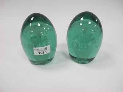 Lot 1019 - A Pair of Late XIX Century Green Glass Dumps,...