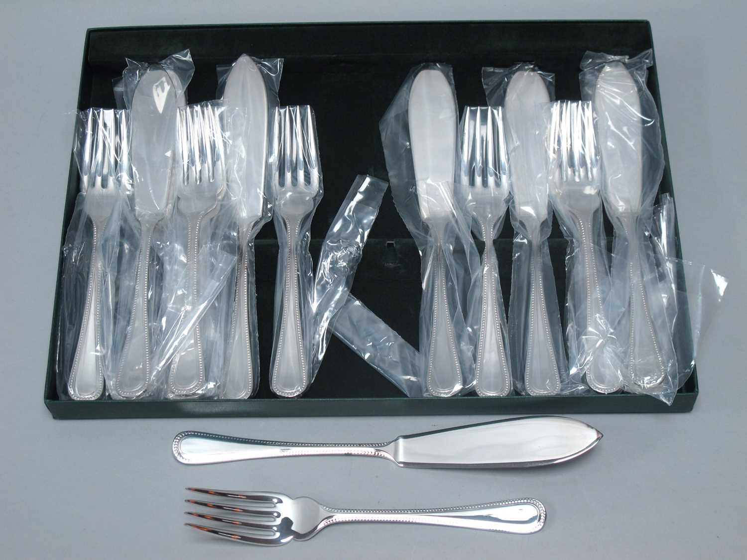 Lot 96 - A Set of Eighteen Hallmarked Silver Beaded...