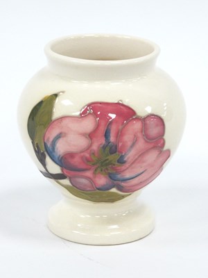 Lot 1238 - Moorcroft Magnolia ovoid vase 9cm tall.