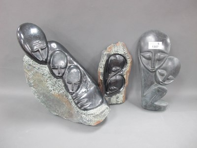 Lot 1307 - African Carved Stone figure group, possibly...