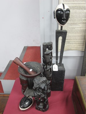 Lot 1316 - African head figures on loop and block pottery...