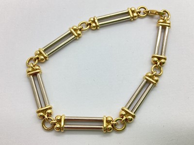 Lot 224 - A Modern Two-Tone Bracelet, to open circle...