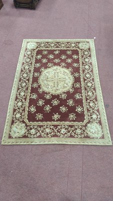 Lot 1527 - Wool Rug, with allover floral motifs and...