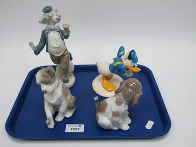 Lot 1237 - Lladro Curious Puppy Dogs, (one chipped),...