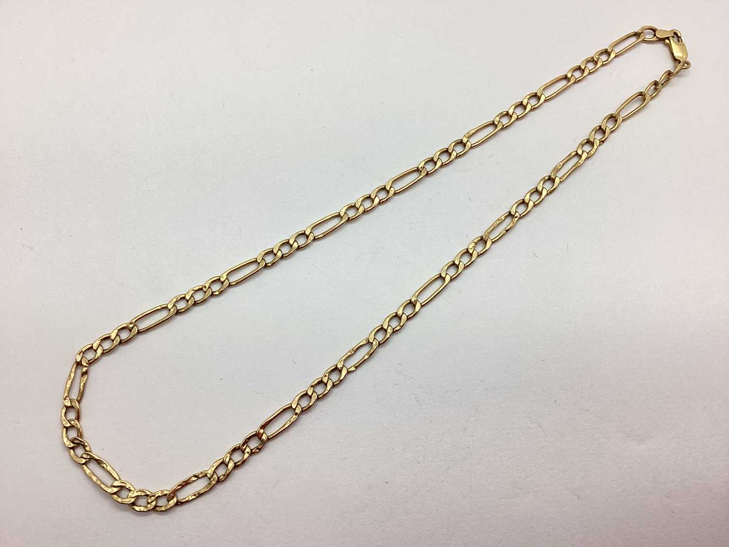 Lot 75 - A Figaro Link Chain, (some damages), stamped...