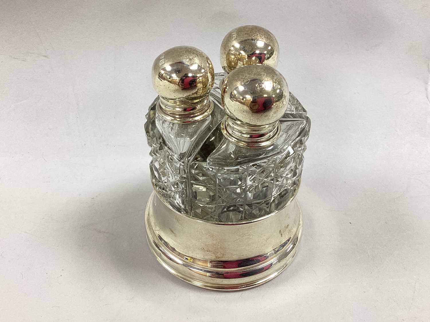 Lot 5 - A Set of Three Hallmarked Silver Mounted Scent...