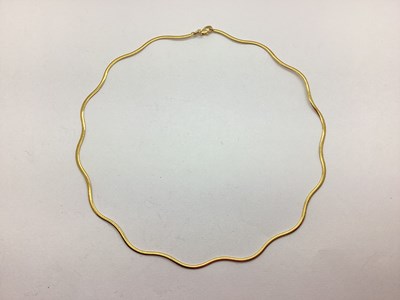 Lot 62 - A 9ct Gold Modern Wavy Flat Link Collarette...