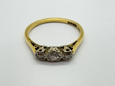 Lot 30 - An 18ct Gold Three Stone Diamond Ring, the...