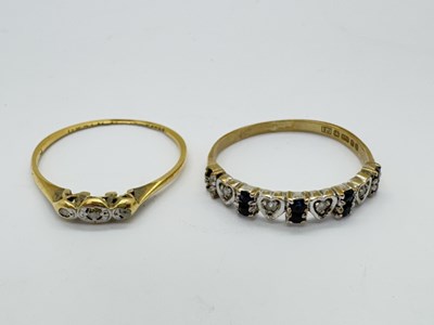 Lot 29 - A 9ct Gold Diamond and Sapphire Set Dress Ring,...