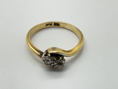 Lot 35 - A Vintage Two Stone Diamond Crossover Ring,...
