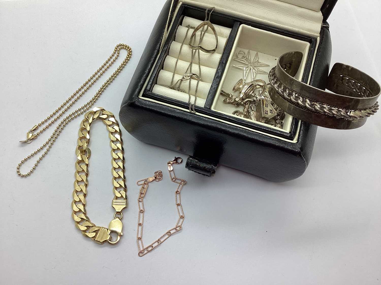 Lot 80 - A Gilt Coloured Curb Style Bracelet, stamped...
