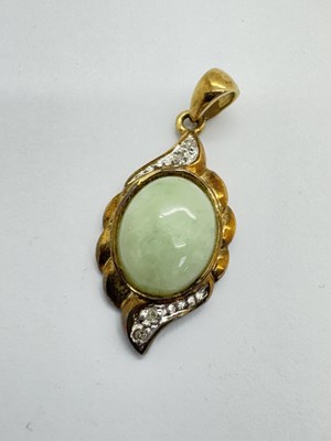 Lot 66 - A 9ct Gold Diamond and Stone Set Pendant, the...