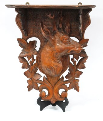 Lot 1281 - A Late XIX Century Black Forest Carved Wood...
