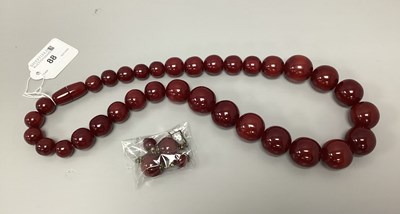 Lot 88 - A Cherry Coloured Beaded Necklace, the...