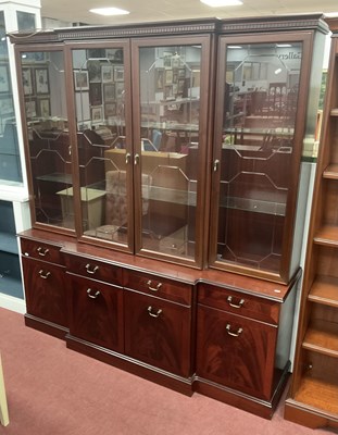 Lot 1516 - A Breakfront Display Cabinet, base with four...
