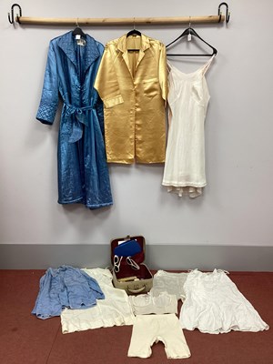 Lot 1399 - A c.1950's Blue Satin Dressing Gown, with...