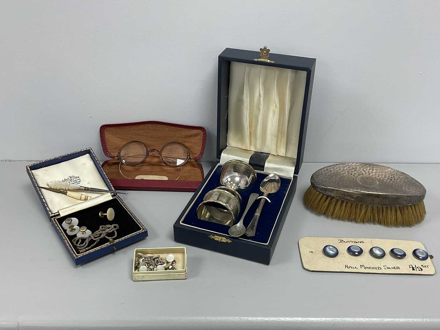 Lot 26 - A Hallmarked Silver Backed Brush, of hammered...