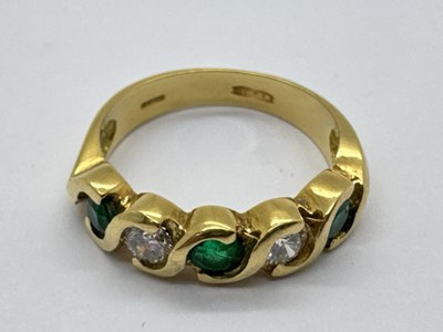 Lot 263 - A Modern 18ct Gold Emerald and Diamond Five...