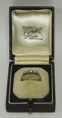 Lot 44 - A Five Stone Diamond Dress Ring, the brilliant...