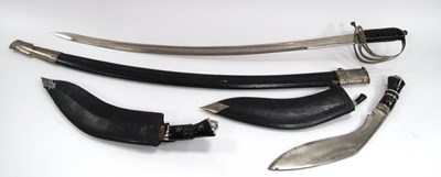 Lot 1342 - Indian Kukri Knives with Lion Mask Handle,...