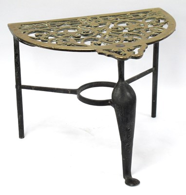 Lot 1288 - A Late XIX Century Brass and Cast Iron Foot...