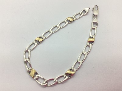 Lot 230 - A Fancy Curb Link Bracelet, with applied...